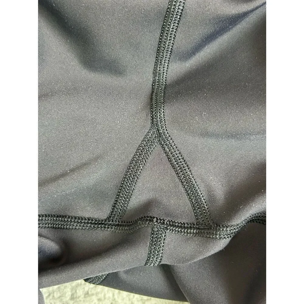 Peloton women’s Black Athletic stretch pants with Mesh and scalloped Trim M